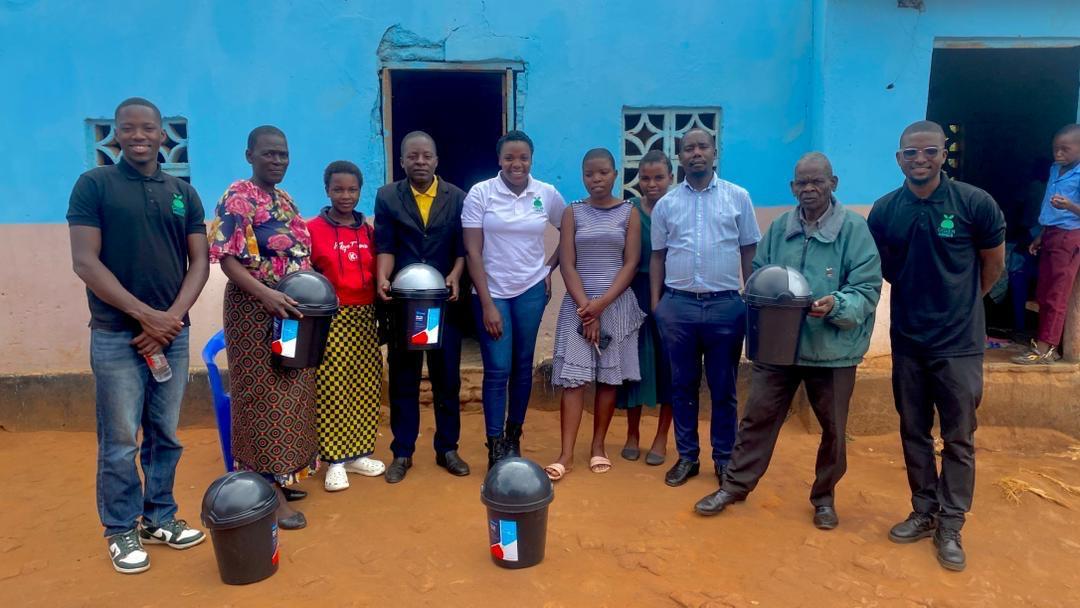 Donating classroom waste bins at Domwe Primary School